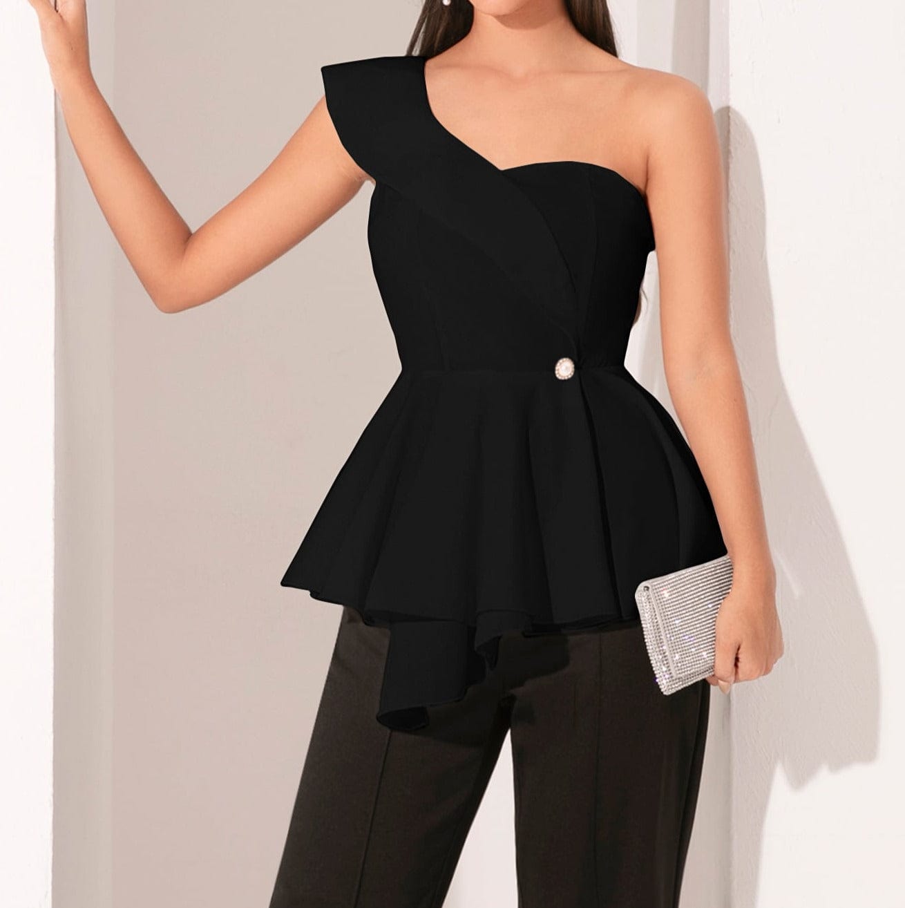 Blusa peplum de un hombro